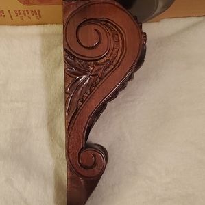 Hand carved mahogany wood wall sconces.